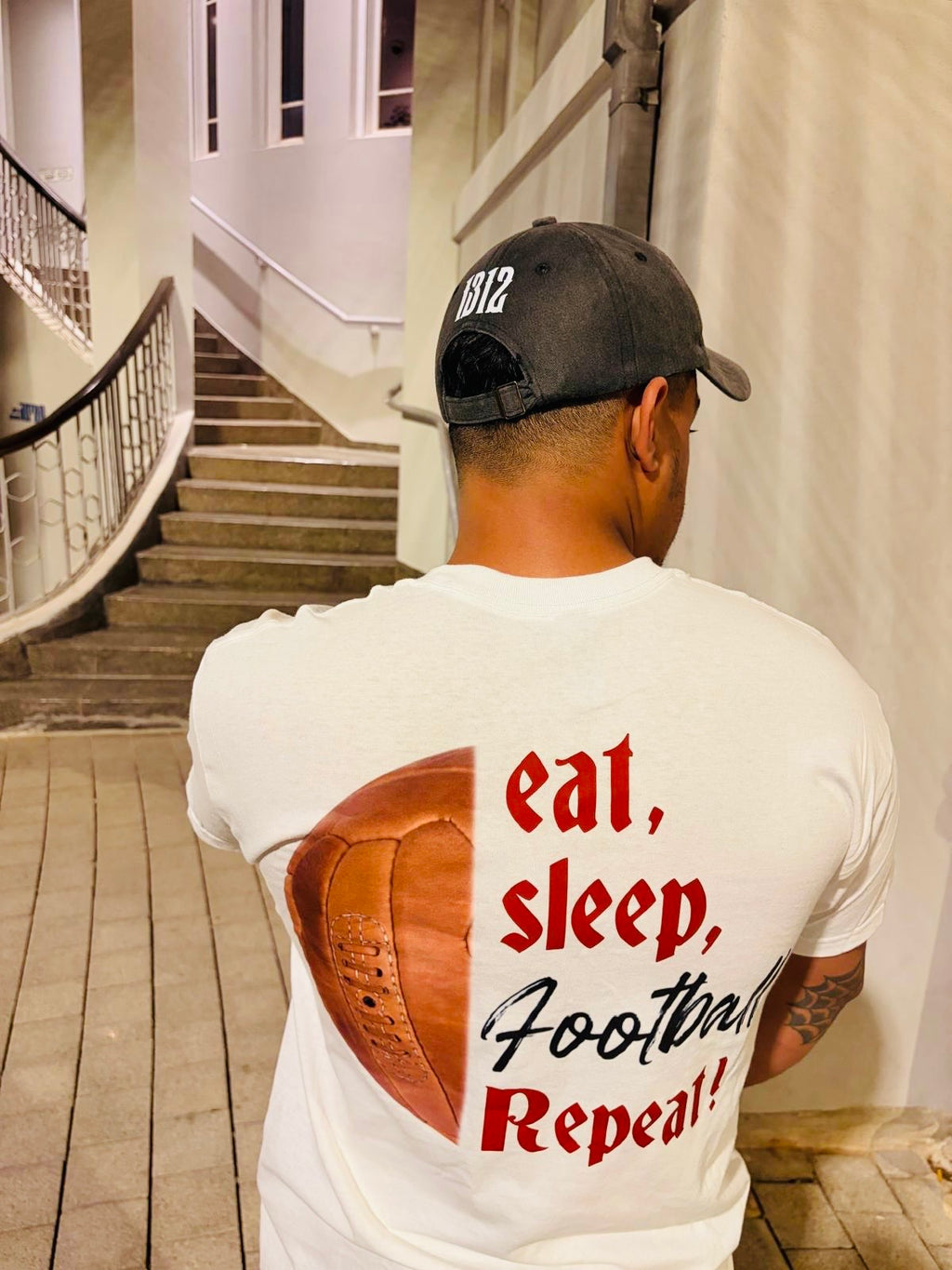 EAT,SLEEP,FOOTBALL,REPEAT' - white T SHIRT.